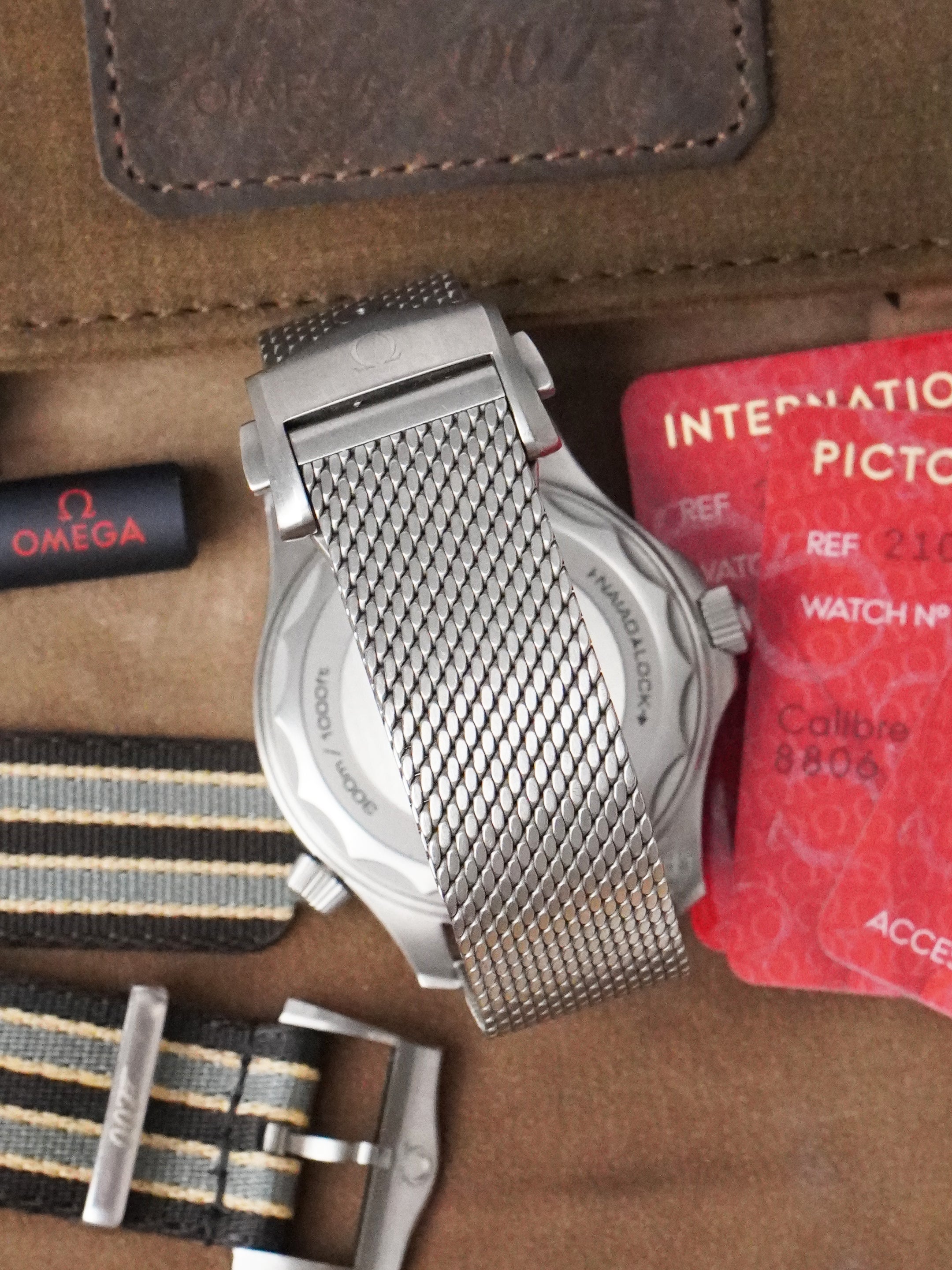 Omega Seamaster Diver 300 M "NTTD" 210.90.42.20.01.001 - Titanium, Brown Dial, Automatic, Full Set (2021)