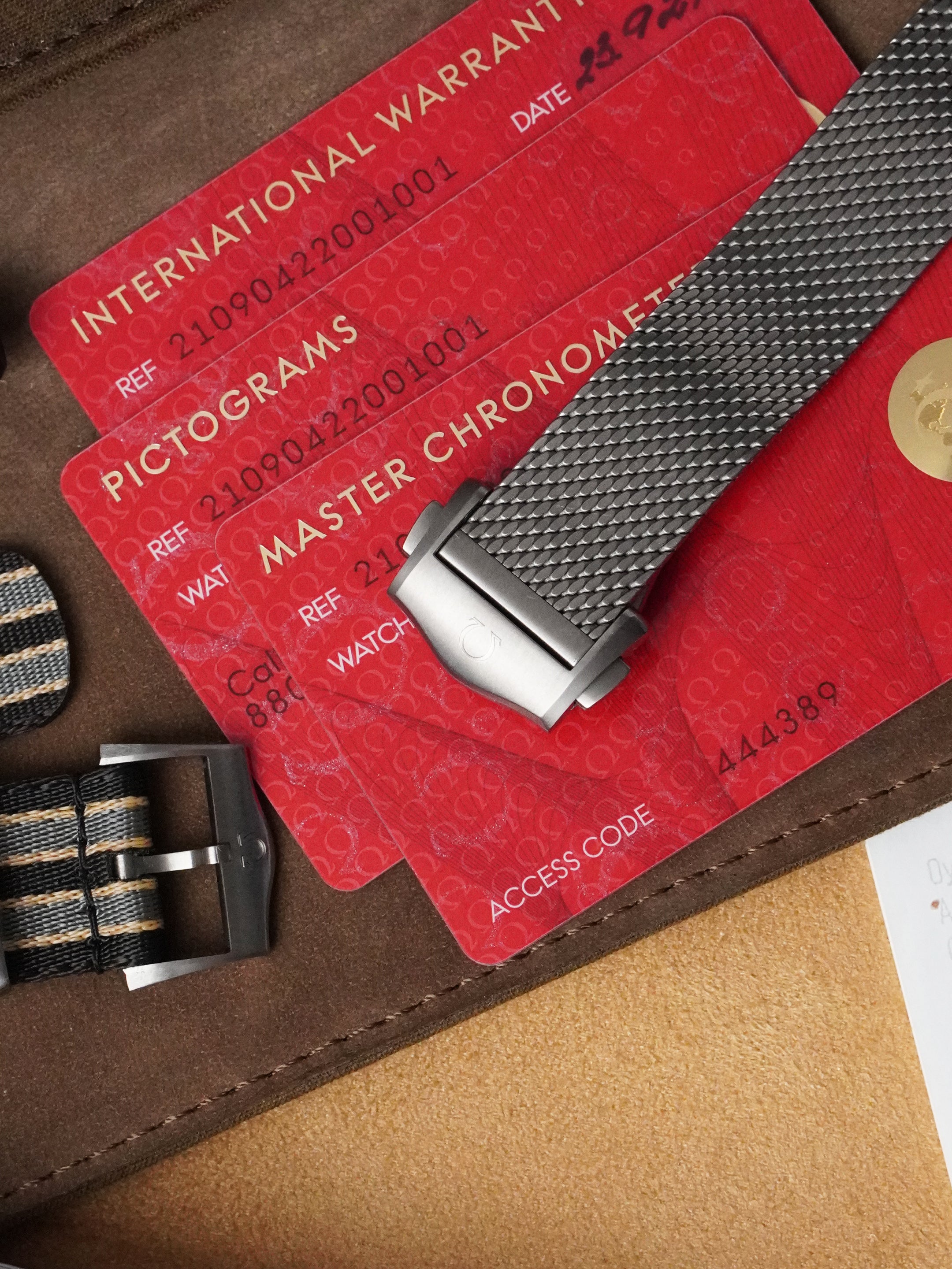 Omega Seamaster Diver 300 M "NTTD" 210.90.42.20.01.001 - Titanium, Brown Dial, Automatic, Full Set (2021)